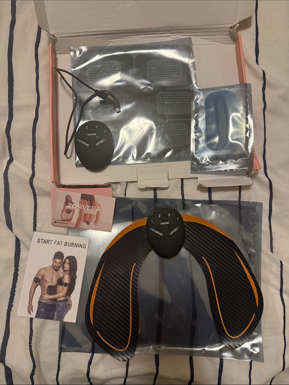 Portable EMS Neck and Ab Stimulator - Black & Orange